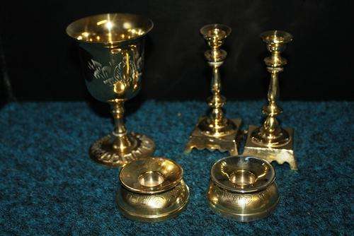 4 x solid brass items .Traveling candle sticks  , pair of candel sticks 115mm  and 1 Goblet 120mm