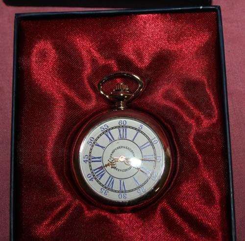 a no brand Quartz pocket watch still in box  (not running battery flat )