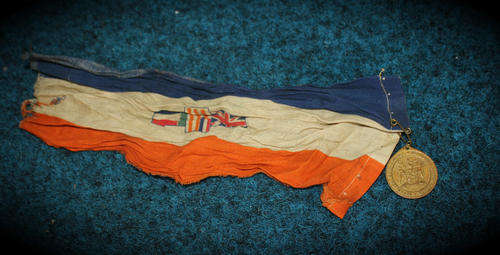 a 1961 Republic Day medal on small Old South African Flag - engraved 31-5-1961