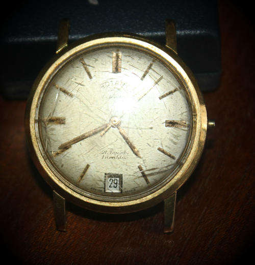 a Vintage Swiss Rotary Incabloc 21 Jewels  watch lens scratched winder missing not working