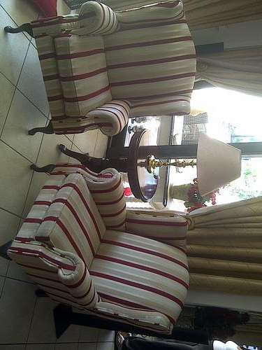 A pair of Queen Anne wing-back chairs