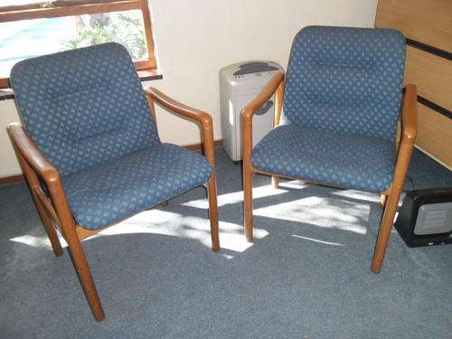 A pair of office chairs