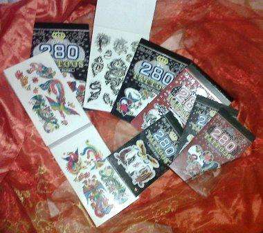 Bulk lot of Tatoo Books - each book contains 280 tatoos:  Your bid secures 8 books.