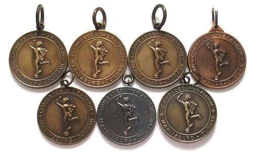 COMRADES MARATHON MEDALLION BRONZE X 7 BID PER MEDAL
