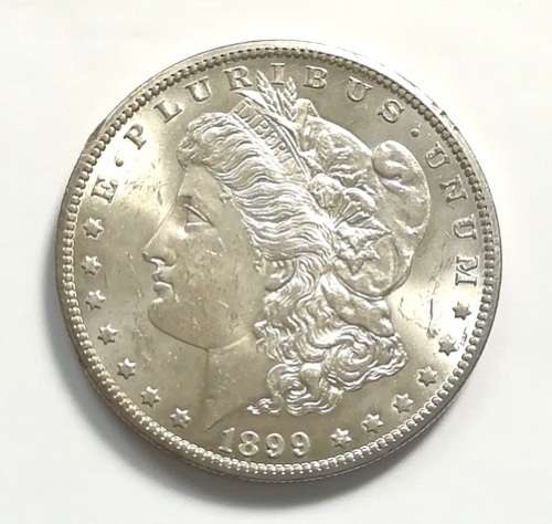 UNITED STATES 1899O SILVER MORGAN DOLLAR  EXCELLENT   **NIK TO RIM**