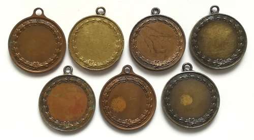 COMRADES MARATHON PIETERMARITZBURG TO DURBAN MEDAL 28MM ** 7 MEDALS**  **BID PER MEDAL**