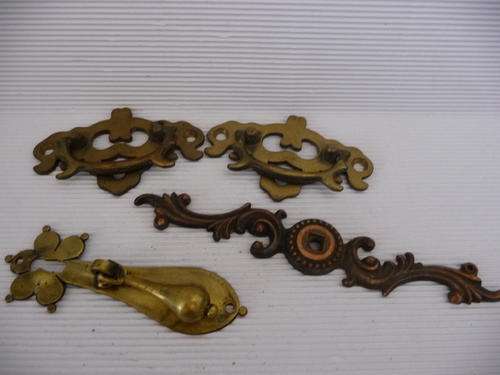Four Old Brass Handles
