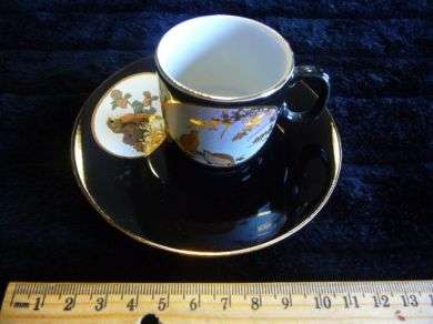 Black Cup and Saucer with design @@@ Crazy R1 Start
