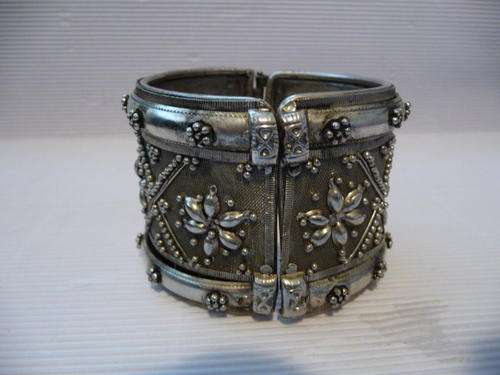Stunning detailed broad bracelet - Not sure, could be silver.
