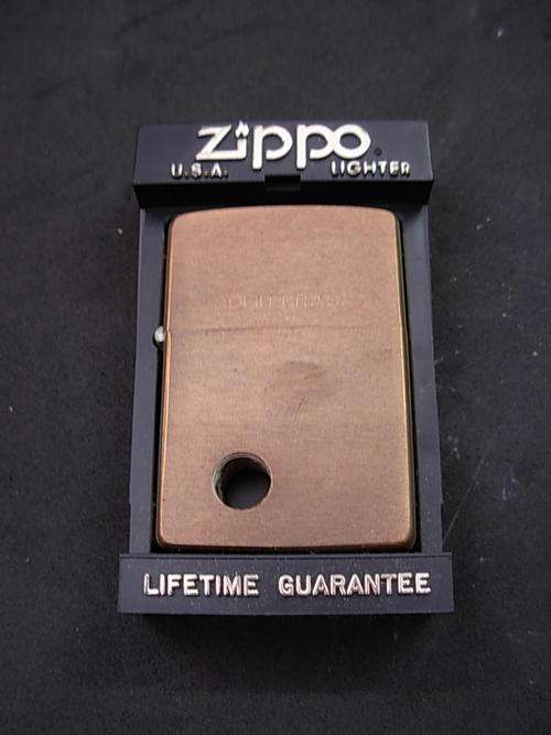 Zippo with custom hole - mint condition
