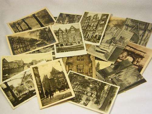 Lot of 25 mostly unused vintage and antique postcards - as per photo