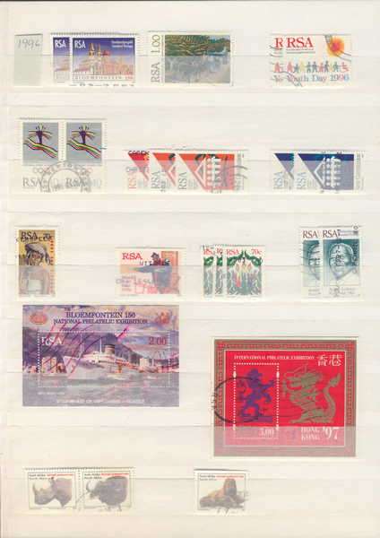 Stamp album with 32 pages filled with more than 500 South African stamps