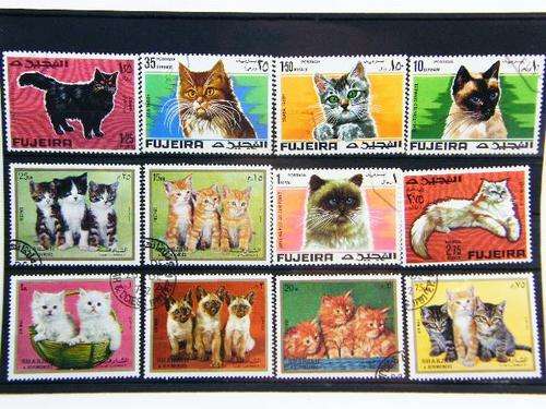 Collection of 12 large thematic cat stamps - as per photo