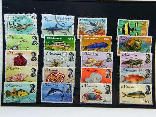 Collection of 20 thematic fish and sea life stamps - as per photo