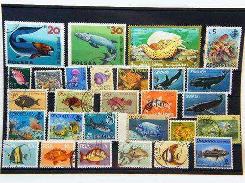 Collection of 28 thematic fish and sea creatures stamps - as per photo