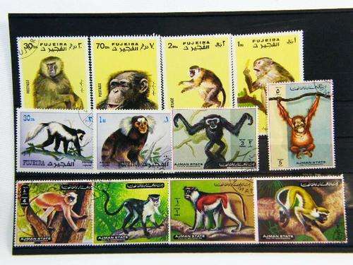 Collection of 12 large thematic primate stamps - as per photo
