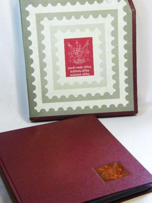 South West Africa stamp album with some stamps - Damaged