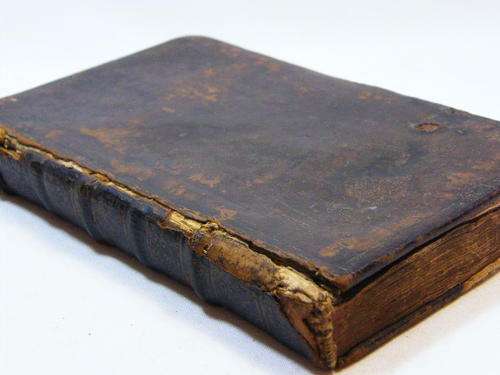 L`Eloge de la Folie book with added European maps - 1800`s or earlier - as per photo
