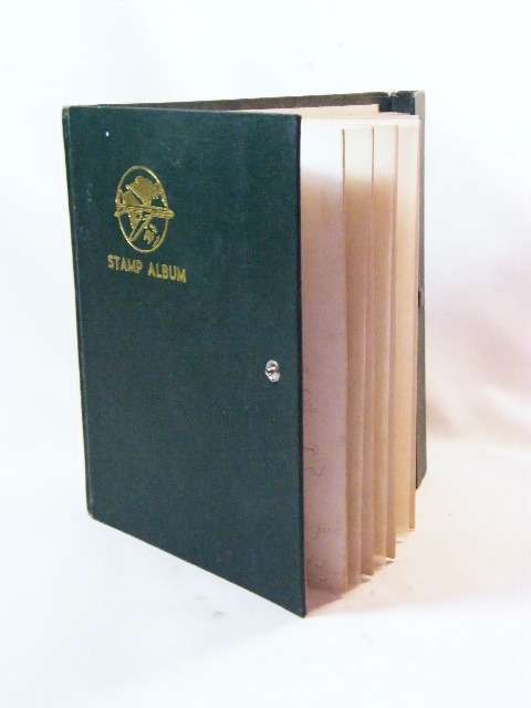 Lots of Belgium stamps in stamp album with over 400 stamps