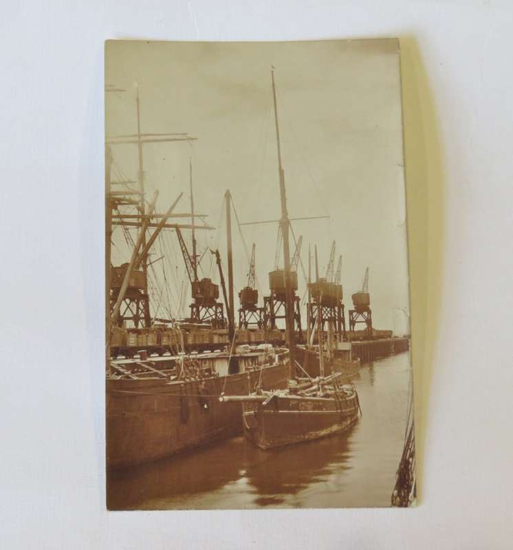 Antique postcard of ship in harbour - Unused