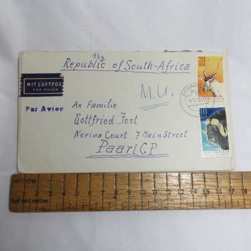 Airmail cover from Schmolln, DDR to Paarl, South Africa with airmail tag and Par Avion ink cancel