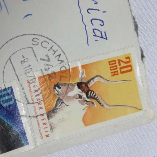 Airmail cover from Schmolln, DDR to Paarl, South Africa with airmail tag and Par Avion ink cancel