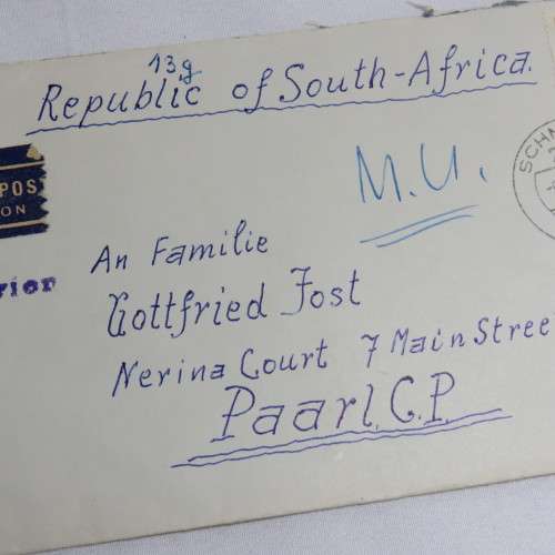Airmail cover from Schmolln, DDR to Paarl, South Africa with airmail tag and Par Avion ink cancel