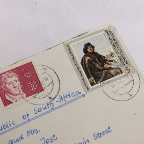 Airmail cover from Schmolln, DDR to Paarl, South Africa with Airmail tag and Par Avion ink cancel