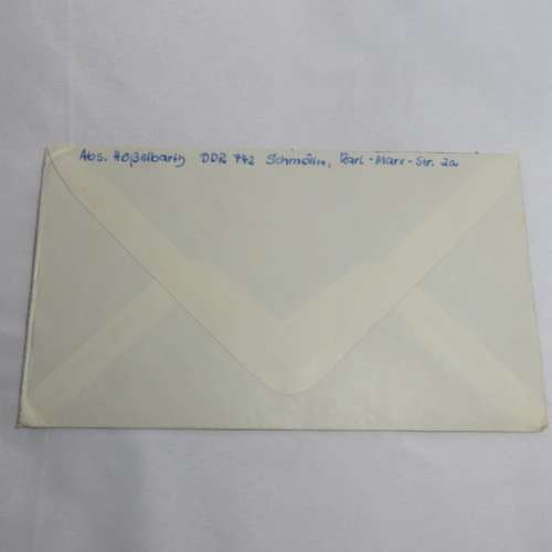 Airmail cover from Schmolln, DDR to Paarl, South Africa with Airmail tag and Par Avion ink cancel