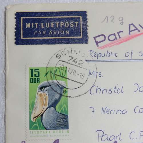 Airmail cover from Schmolln, DDR to Paarl, South Africa with airmail tag, Par Avion ink cancel