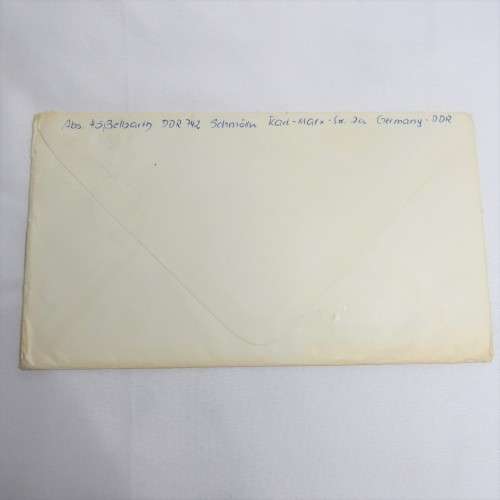 Airmail cover from Schmolln, DDR to Paarl, South Africa with airmail tag, Par Avion ink cancel