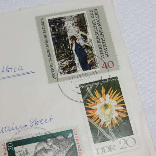 Airmail cover from Schmolln, DDR to Paarl, South Africa with airmail tag and Par Avion ink cancel