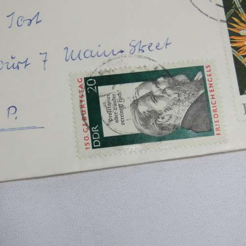 Airmail cover from Schmolln, DDR to Paarl, South Africa with airmail tag and Par Avion ink cancel