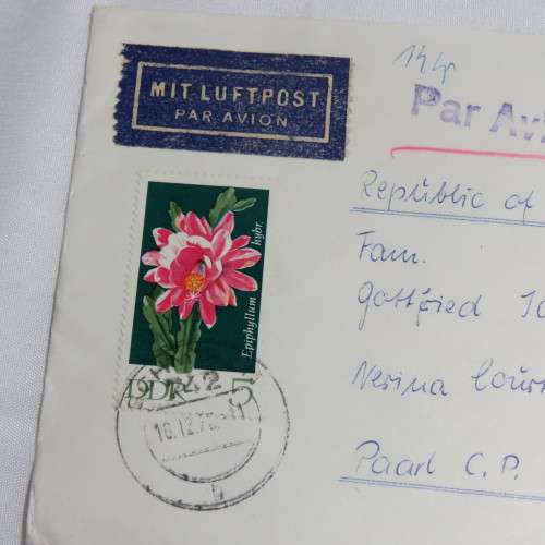 Airmail cover from Schmolln, DDR to Paarl, South Africa with airmail tag and Par Avion ink cancel