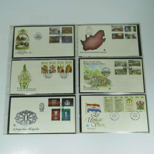 Collection of over 60 SA First Day covers and lot of extra items