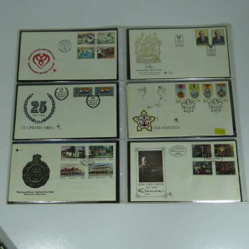 Collection of over 60 SA First Day covers and lot of extra items