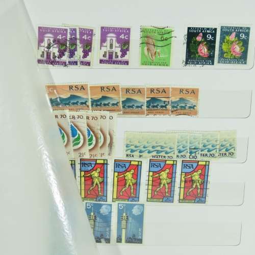 Stamp Album with over 450 South Africa stamps - With 12 page album