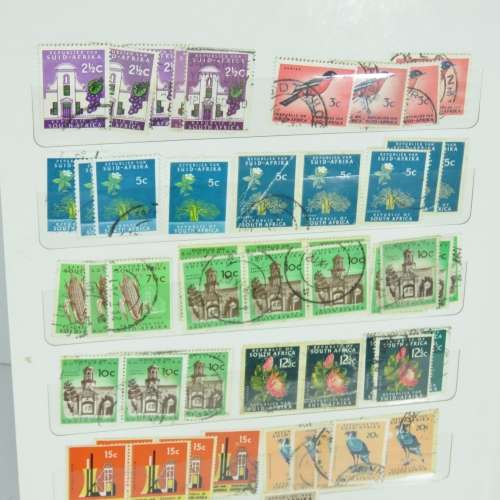 Stamp Album with over 450 South Africa stamps - With 12 page album