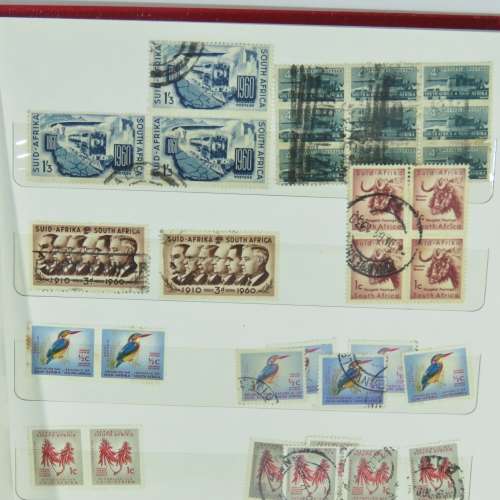 Stamp Album with over 450 South Africa stamps - With 12 page album