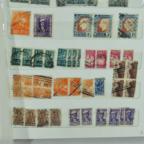 Stamp Album with over 450 South Africa stamps - With 12 page album