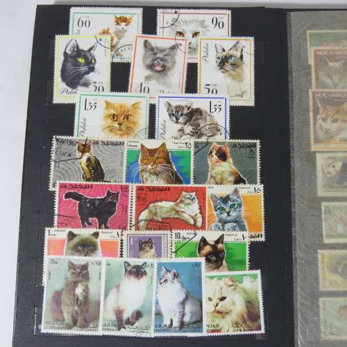 Lot of 380 animal stamps in album - Dogs, cats and other animals
