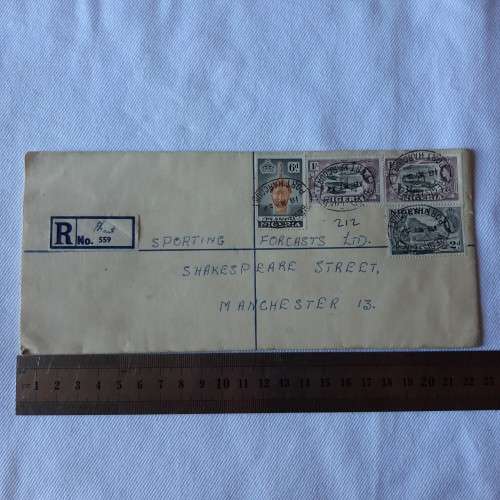 Registered postal cover from Lagos, Nigeria to Manchester, England with 4 Nigerian stamps