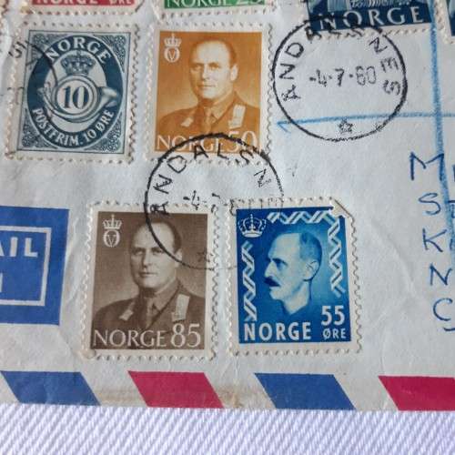 Registered airmail cover from Andalsnes to Cape Town, South Africa with 15 Norwegian stamps