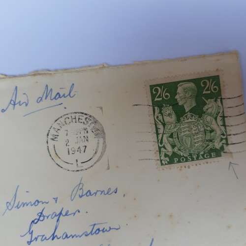 Postal cover from Manchester, England to Port Elizabeth, South Africa - with 2/6 British stamp