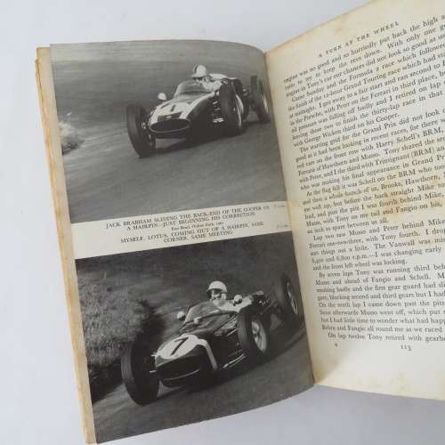 A turn at the wheel by Stirling Moss - Signed by Stirling Moss