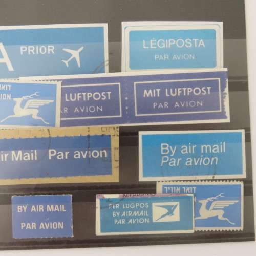Lot of 14 airmail and priority stickers/stamps