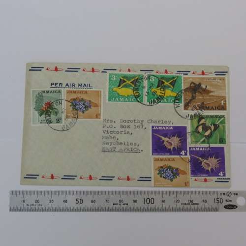 Airmail cover sent from Kingston, Jamaica to Mahe, Seychelles with 9 colorful Jamaican stamps