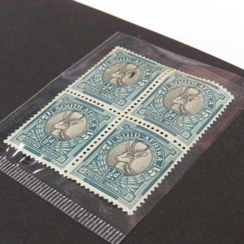 SACC 113 error stamp white mark to left springbok - Top left Afrikaans stamp