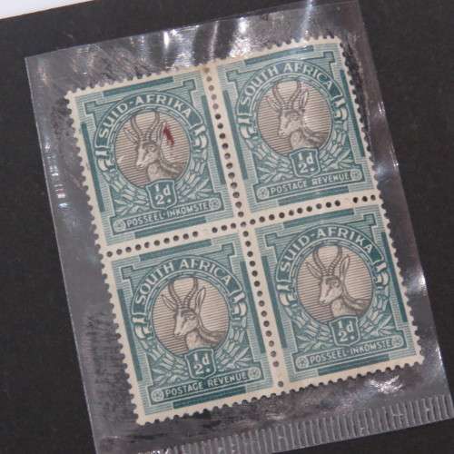SACC 113 error stamp white mark to left springbok - Top left Afrikaans stamp