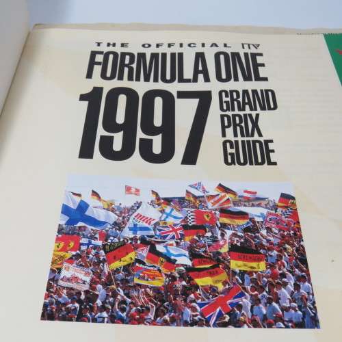 The Official Formula One 1997 Grand Prix Guide - including newspaper with article
